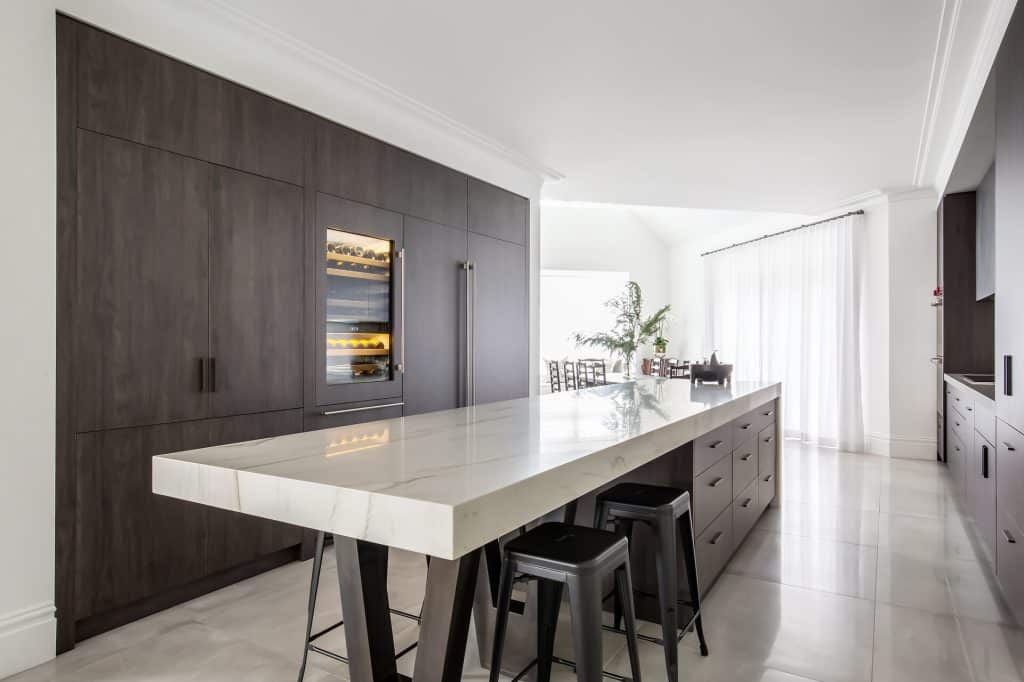 Stunning kitchen renovation with tiles in muted tones