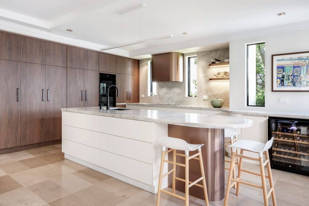 Warm toned tiles warm up this Kitchen space