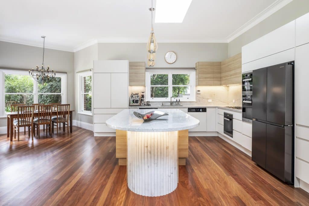 A light and airy kitchen renovation with wooden floors and mixed finishings that compliment each other