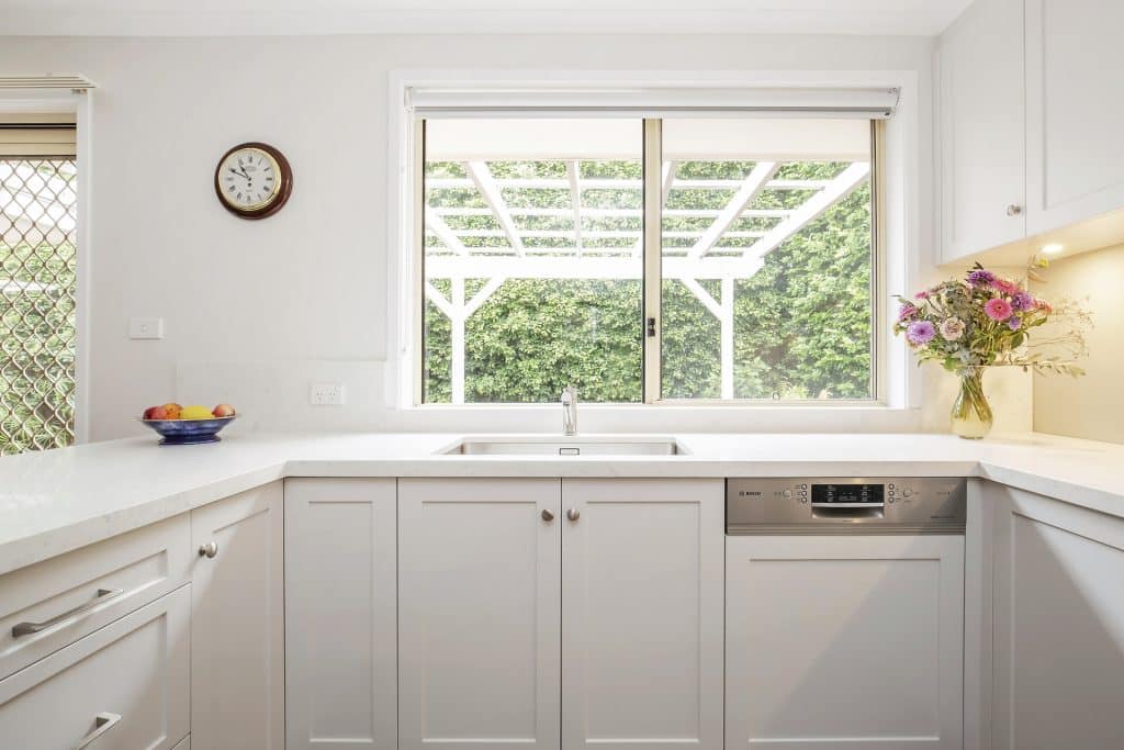 Gorgeous kitchen renovation with a garden view