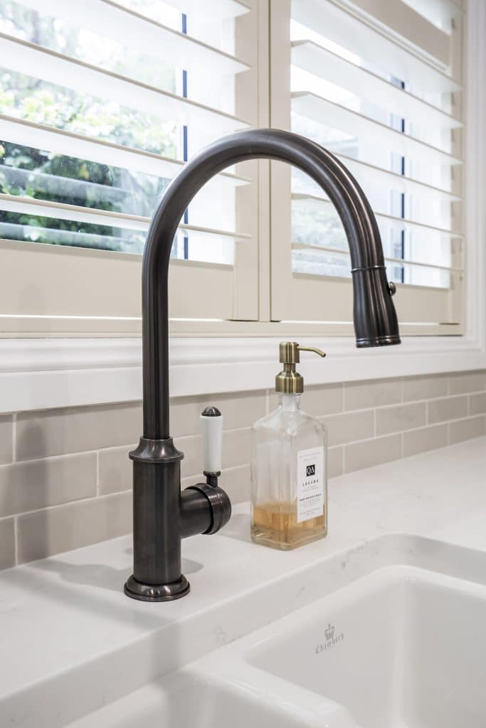 Black tapware compliments the elegance of the renovation