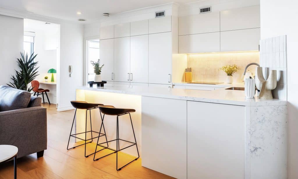 Chic kitchen renovation with under counter lighting accent